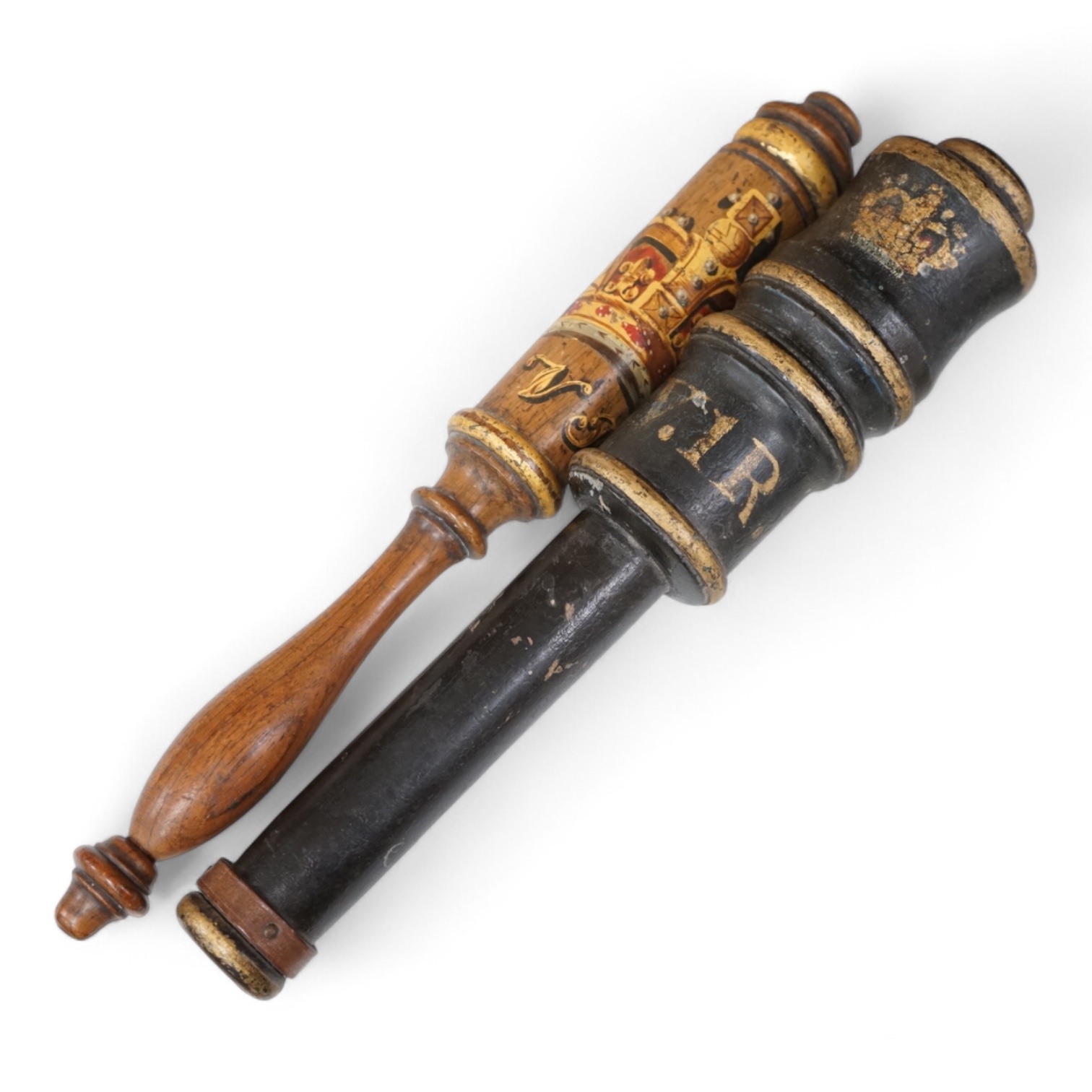 Two Victorian turned and painted wood tipstaffs, each painted with the Royal cypher, one inscribed ‘York’, largest 33cm in length